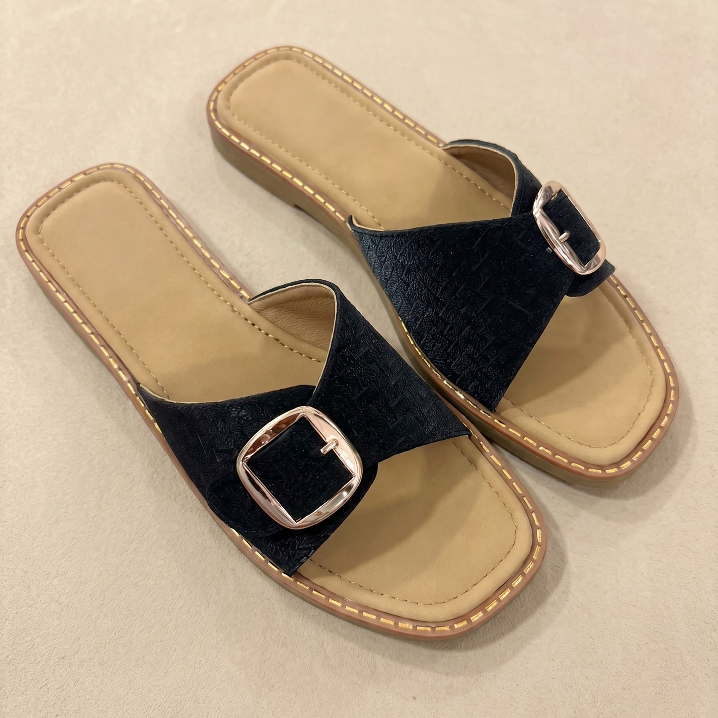 Aashna buckled sliders in black